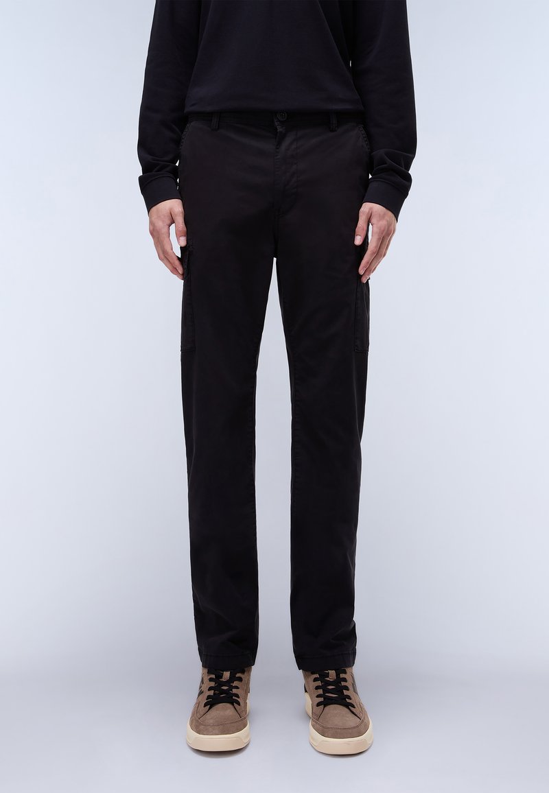 Black cargo pants with a straight cut, made of smooth fabric. Features side pockets, a button closure, and worn with beige sneakers.