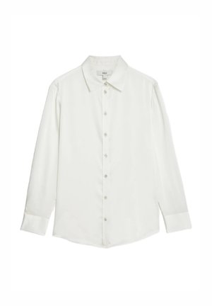 Camicia bianca a maniche lunghe con colletto classico, apertura frontale con bottoni e una texture di tessuto liscia. Presenta polsini con bottone e una vestibilità su misura.