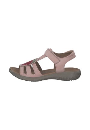 Pink sandal with open toe and cut-out design, featuring decorative strap with a strawberry detail, and a cushioned grey sole.
