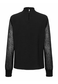 Zwarte blouse met lange, doorschijnende mouwen met luipaardprint. Gestructureerd lijfje, hoge halslijn en open rug met knoopsluiting. Gerimpelde manchetten.