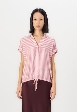 Kortermet skjorte med krage i rosa og hvite striper, med en knytebånd nederst og løs passform. Glatt stoff med lett tekstur.