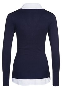 Navy blue sweater with long sleeves and a white collar. Knitted texture with a fitted silhouette and ribbed hem detail.