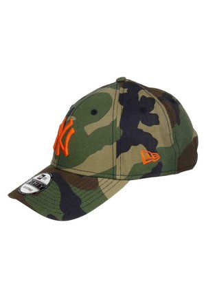Camo baseball cap in green and brown, with orange embroidered logo and accent. Features a curved visor and adjustable strap at the back.