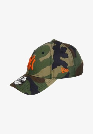 Camo baseball cap in green and brown, with orange embroidered logo and accent. Features a curved visor and adjustable strap at the back.