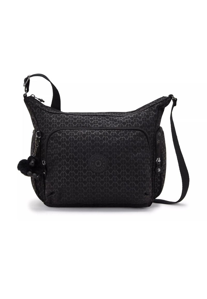 Black textured crossbody bag featuring a geometric pattern, a front zip pocket, a round logo patch, and a pom-pom accent.