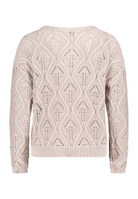 Pull en dentelle tricoté en beige doux, avec un motif en diamant, des manches longues et un ourlet côtelé. Le tissage ouvert ajoute de la texture et de la respirabilité.