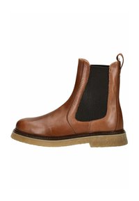 Bottines Chelsea en cuir marron avec panneaux élastiques sur les côtés, languette de traction et semelle en caoutchouc texturé. Fini lisse avec des accents noirs contrastants.