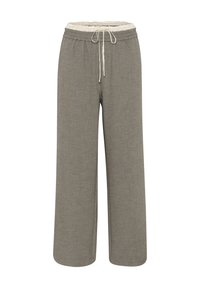 Helle graue Stoffhose mit weitem Bein. Elastischer Bund mit Kordelzug. Strukturiertes Finish, keine sichtbaren Muster oder Akzente.