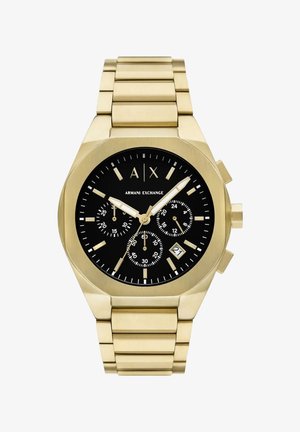 Kuldne roostevaba terasest kell musta sihikuga, millel on kolm alamsihikut, tunninäidikud ja kuupäeva ekraan. Rihmasarnane kellarihm on harjatud viimistlusega.