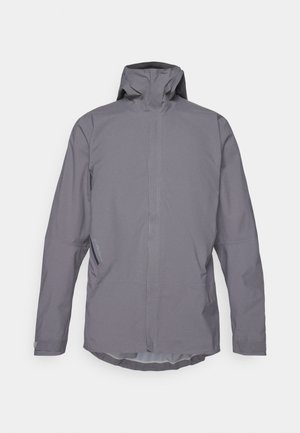 Jachetă impermeabilă gri, cu guler înalt, mâneci lungi și un design curat, minimalist. Echipată cu buzunare laterale și o textură netedă.