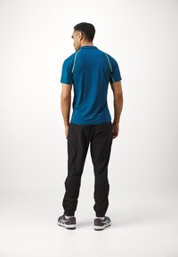 ASICS MATCH PANT - Joggebukse - performance black
