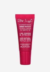 Red tube with a flip cap, labeled "Dr. Lipp Superfood Sweet Potato Tint." Size 8ml, multi-use for lips, cheeks, and eyelids.