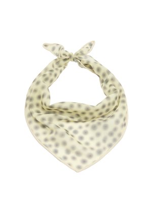 Jedwabna kremowa bandana związaną kokardą i subtelnym ciemnym wzorem w kropki, rozłożona płasko na białym tle.