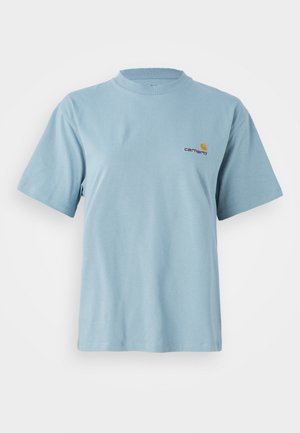 T-shirt en coton bleu clair à manches courtes avec col rond et petit logo Carhartt jaune et rouge sur la poitrine gauche.