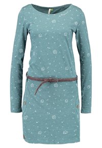 Teal long-sleeve dress with white dandelion prints, round neckline, front pockets with buttons, and a brown braided belt at the waist.