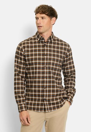Brown plaid button-up shirt with blue and white accents, long sleeves, and a regular collar, worn with light-colored pants.