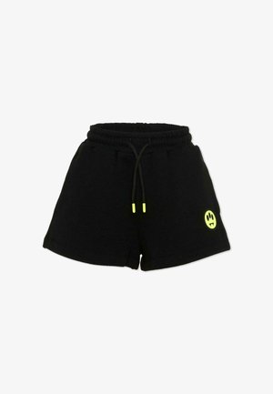 Shorts à taille élastique noire avec cordon de serrage, extrémités jaune néon, et un petit logo de visage souriant jaune néon sur la jambe gauche.