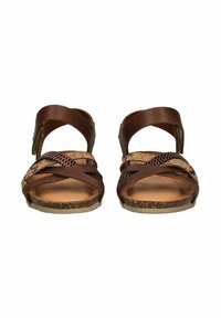 Brown leather sandals with cross straps, featuring a textured accent and cork footbed. Adjustable ankle strap, flat sole.