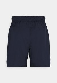Shorts bleu marine avec taille élastique, tissu lisse et coupe décontractée, conçus pour un usage décontracté ou sportif.