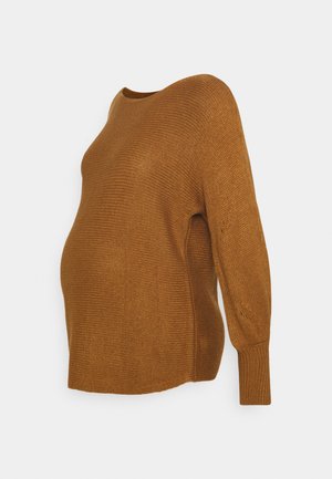 Knit pregnancy sweater in mustard brown. Features a rounded neckline, long sleeves, and textured fabric, gently accommodating a growing belly.