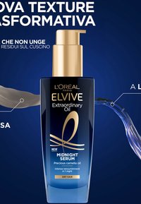 Il Siero di Mezzanotte L'Oréal Elvive in una bottiglia di vetro blu con erogatore presenta un cappuccio dorato. Il design evidenzia i benefici di "Olio Straordinario" e "capelli secchi".