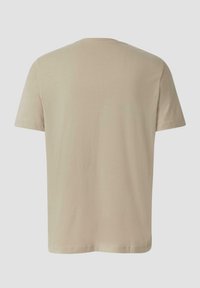 Beige katoenen T-shirt met een ronde hals en korte mouwen. Glad textuur met een rechte snit, zonder patronen of zichtbare hardware.