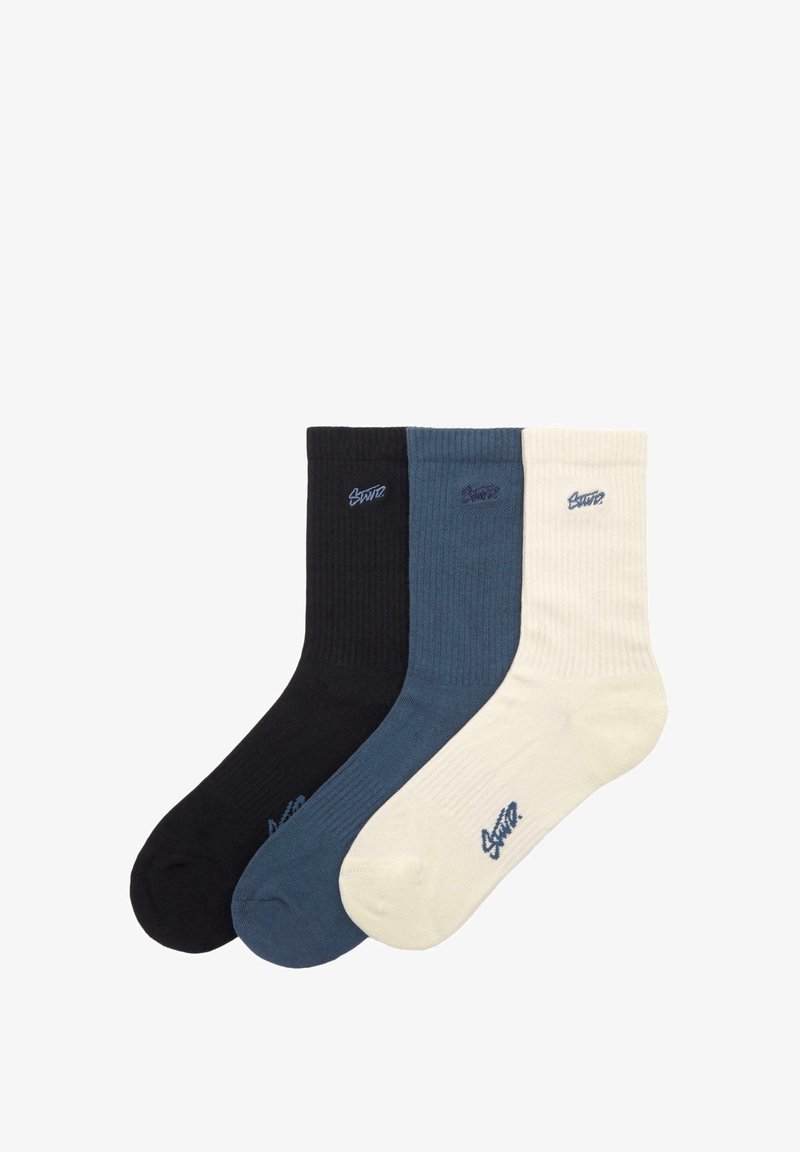 Drei Paar gerippte Socken: dunkelblau, dunkelgrau und creme. Jede Socke hat ein kleines blaues Logo nahe der Oberkante.