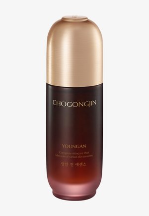 Dunkle bernsteinfarbene Hautpflegeflasche mit goldenem, abgerundetem Deckel, beschriftet mit CHOGONGJIN YOUNGAN, für umfassende Hautpflege zur Behandlung verschiedener Hautprobleme.