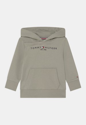 Light gray hooded sweatshirt with kangaroo pocket, ribbed cuffs, and hem. "Tommy Hilfiger EST. 1985" printed across the chest.