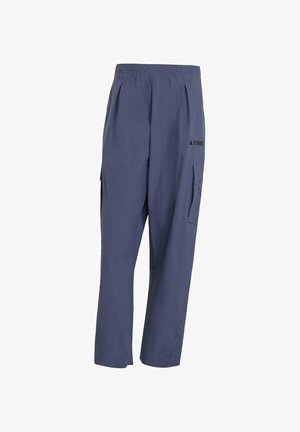 Navy blue cargo pants made of lightweight fabric featuring an elastic waistband, pleats, and two side pockets, with a branded logo accent.