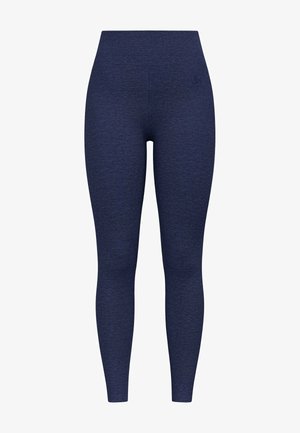 Leggings bleu marine avec un motif texturé et chiné, taille haute et coupe ajustée, conçus pour le confort et la flexibilité pendant l'activité.