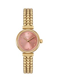 Guldfarvet ur med en rund pink urskive, der har punktmarkeringer og guldvisere. Remmen består af et tekstureret design i guldmetal.
