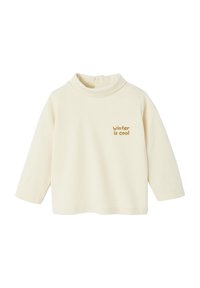 Hellbeige Langarm-Turtleneck aus weichem Stoff, mit rundem Kragen und dem Schriftzug "Winter ist cool" in Braun auf der Brust.