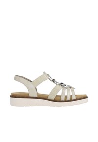 Sandal beige chiaro con cinturini elastici, rifiniture in argento e soletta imbottita. Presenta una suola bianca texturizzata con motivo a rilievo per una buona aderenza.