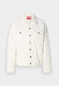 Veste en denim blanche avec de petits motifs floraux roses, deux poches avant et boutons-pression argentés sur la fermeture. Tissu texturé. Coupe courte.