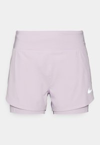 Pantaloni sportivi lilla con vita alta, design a strati e logo Nike bianco sul lato destro in basso. Tessuto liscio e leggero.