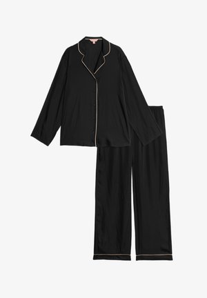 Ensemble de pyjama noir en tissu lisse, comprenant un haut à manches longues à boutons avec un col à revers et un passepoil de couleur claire contrastant, ainsi que un pantalon ample.