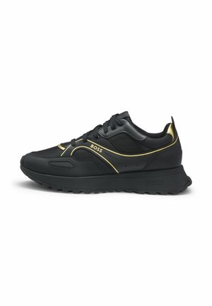 Schwarze Turnschuhe mit goldenen Akzenten, ausgestattet mit einem glatten synthetischen Obermaterial, strukturierten Einsätzen, runder Zehenpartie und einer Gummi-Laufsohle mit Grip.