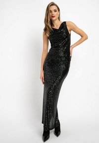 Schwarzes, glitzerndes Abendkleid mit figurbetontem Schnitt, tiefem Ausschnitt und ärmellosem Design. Es zeichnet sich durch einen subtilen Glanz und einen bodenlangen Schnitt aus.