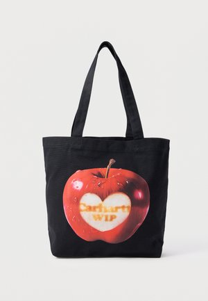 Borsa tote nera con manici lunghi, caratterizzata da una grafica di una mela rossa con un morso a forma di cuore e testo sfocato all'interno del cuore.