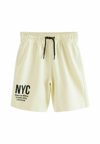 Ljusgrå shorts med elastisk midja och svart dragsko. Tryckt text "NYC" i svart på vänster ben. Inkluderar sidofickor.