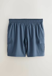 Smaragdgrüne Cargo-Shorts mit elastischem Bund, zwei Seitentaschen und einer aufgesetzten Tasche am linken Oberschenkel. Glatte Textur.
