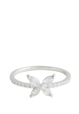 Silver ring with a butterfly made of four marquise-cut clear gemstones and small round stones along the band.