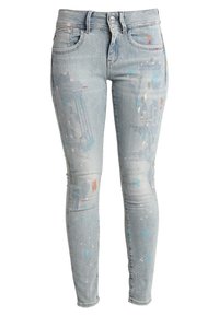 Ljust blå denim skinny jeans med flerfärgade färgfläckar, femficksdesign och normal midja.
