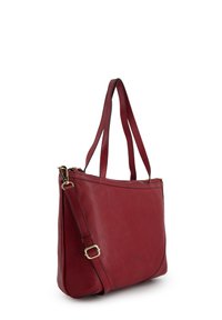 Red leather handbag with two shoulder straps, a detachable crossbody strap, and a zip closure. Features gold-tone hardware and embossed logo.