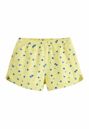 Gule bomuldsshorts med lille blåt blomsterprint, elastisk talje og sidelommer.