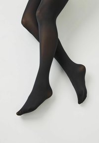 Sorte tights med en glat overflade, tætsiddende design og semi-opaque finish, der har en sømløs tå og ingen synlige mønstre.