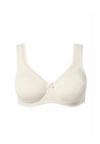 Kremfarvet bh med fuld dækning på skålene, blondekant på stropper og udskæring samt en lille central sløjfe.