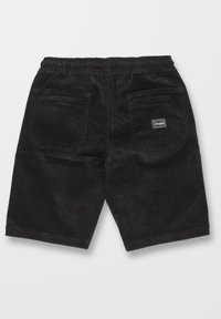 Short en velours côtelé noir avec taille élastique et deux poches plaquées à l'arrière, une poche avec une petite étiquette blanche Volcom.