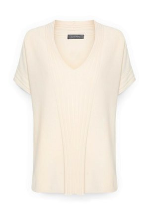 Blusa a maniche corte color crema con scollo a V e dettagli verticali plissettati sulla parte anteriore e sulle maniche.